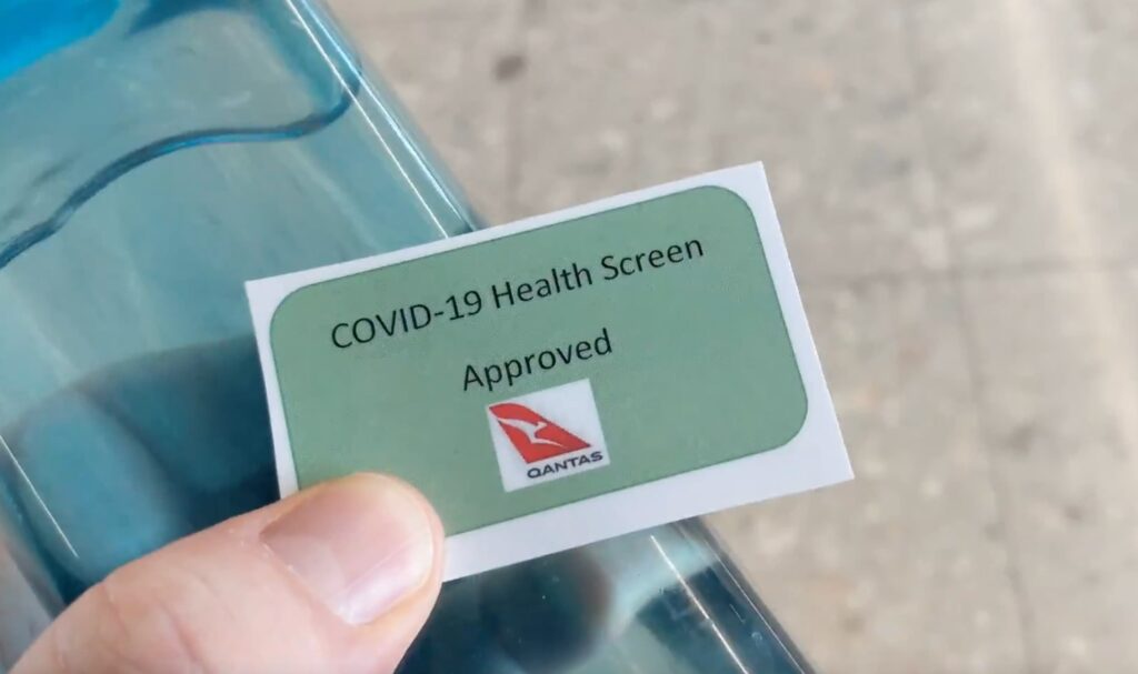 A card reads: COVID-19 Health Screen Approved