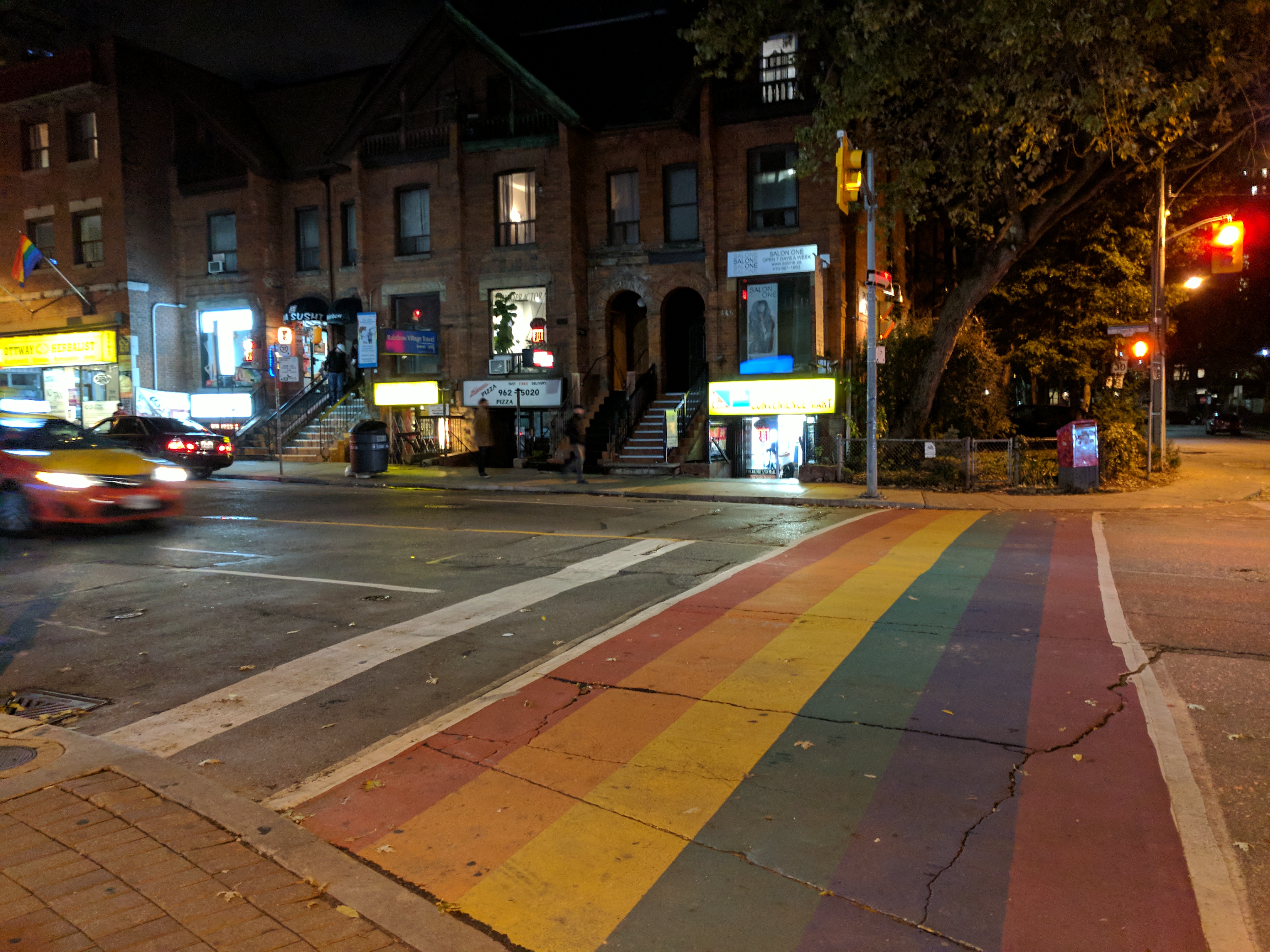 Rainbow crosswalk at night