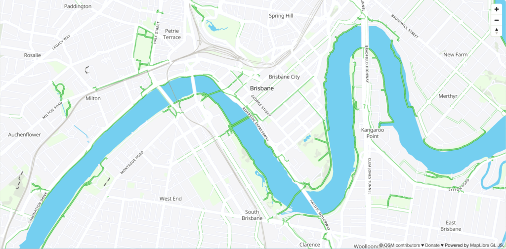 A map of Brisbane. It's fairly desaturated, except for the green cycleways and bike lanes everywhere.